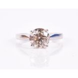 An 18ct white gold and solitaire diamond ring set with a round brilliant-cut diamond of 2.20 carats,