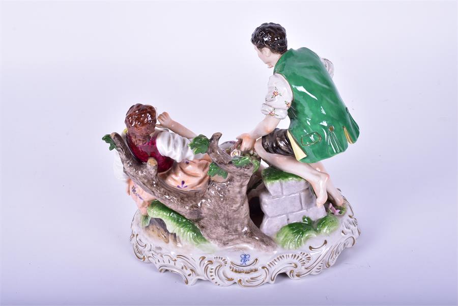 A Rudolph Kammer porcelain figure group  of a pair of lovers with their dog, the male slipping - Image 5 of 5