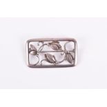 George Jensen. A Danish sterling silver floral brooch of rectangular form, with four flowers,
