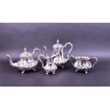 A late Victorian four-piece piece silver tea set by Walker and Hall, Sheffield 1901, comprising a