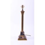 A 20th century brass and marble desk lamp in the form of a Corinthian column the sectional stepped