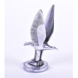 A 1930s chrome eagle car mascot 21 cm high.