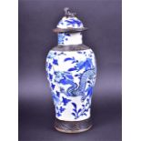 An early 20th century Chinese export jar and cover of baluster form, decorated in underglaze blue