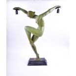 A large figural hollowcast metalware lamp base in the art deco style modelled as a nude dancer