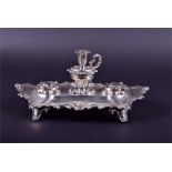 A Victorian silver inkstand Sheffield 1944 by Henry Wilkinson & Co. with a central pot and taper