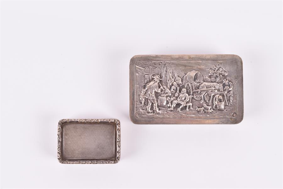 A silver snuffbox hallmarked Birmingham 1968, together with a larger Dutch white metal snuff box,