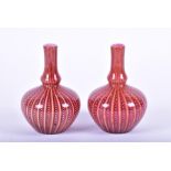 A pair of late 19th century Stevens & Williams 'Osiris ware' art glass vases each of tapering