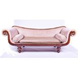 A William IV mahogany scroll end settee with carved show wood frame, and upholstered arms back and