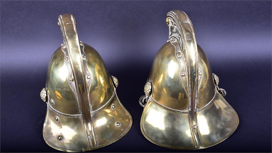 A set of two late 19th/early 20th century Merryweather & Sons brass fireman helmets each mounted - Image 5 of 6