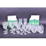 A part-suite of Waterford Crystal glassware comprising wine glasses, tumblers, sherry glasses and