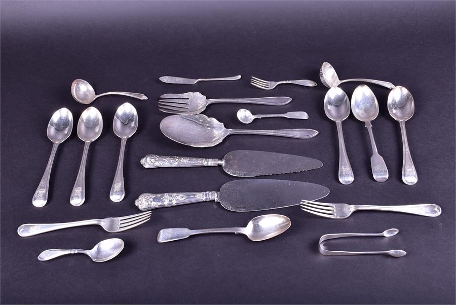 A mixed lot of 19th century and later silver flatware to include fish eaters, table spoons, forks,