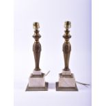 A small pair of 20th century white alabaster and brass desk lamps with sectional stepped bases and