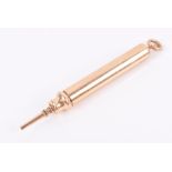 A 9ct yellow gold propelling pencil of smooth rounded form, 8.5 cm, long, 28 grams.