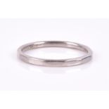 A platinum wedding band of shaped circular form, size Q 1/2, 3.1 grams.