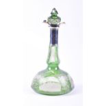 A late 19th century Bohemian green glass decanter with silver mounts of wide-bottomed form with