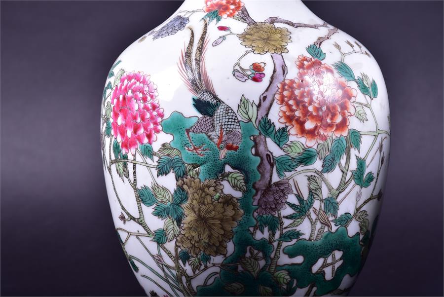 A pair of 19th century Chinese porcelain vases the ovoid shaped bodies decorated with enamelled - Image 3 of 21