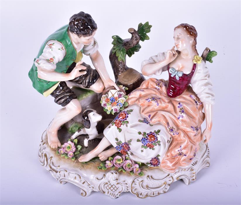 A Rudolph Kammer porcelain figure group  of a pair of lovers with their dog, the male slipping - Image 4 of 5