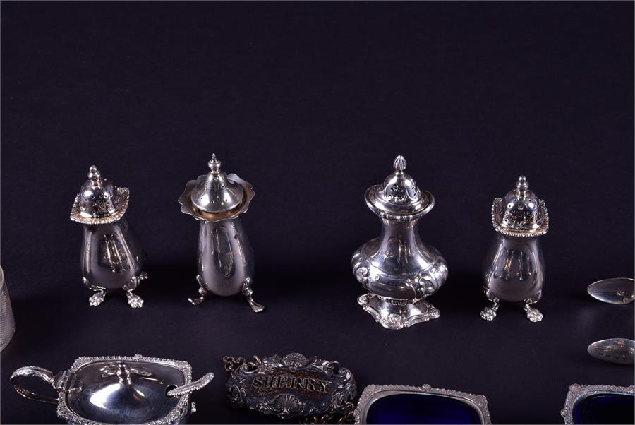 A mixed group of Victorian and later silver cruets comprising a pair of open salts, a covered - Image 2 of 10