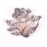 A late 19th / early 20th century diamond floral brooch set with old mixed-cut diamonds, of