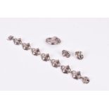 George Jensen. A Danish sterling silver floral bracelet numbered 100b, together with a matching