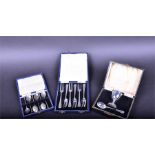 A set of six silver boxed coffee spoons Birmingham 1.6 ozt, together with a cased egg cup and