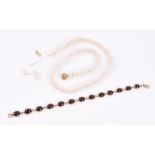 A yellow gold and garnet bracelet 19 cm long, 11.2 grams, together with a pearl necklace with 14k