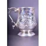 A Victorian silver embossed tankard Birmingham 1868 by Hirons, Plante & Co, embossed with flowers