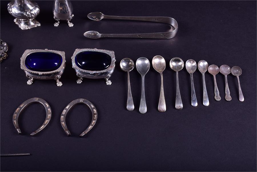 A mixed group of Victorian and later silver cruets comprising a pair of open salts, a covered - Image 4 of 10