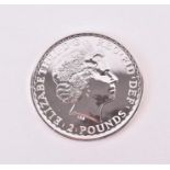 MIXED COINS, GREAT BRITAIN. A mint tube of twenty Fine Silver Britannias, 2014 Contained in the