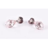 A pair of white metal, diamond, and pink morganite drop earrings each suspended with a faceted