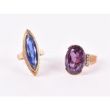 An 18ct yellow gold and synthetic Alexandrite or corundum ring size N 1/2, 9.5 grams, together