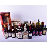 A large collection of vintage wines and spirits to include three boxed Bell's Scotch Whisky, a boxed