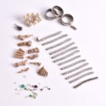 A quantity of jewellers offcuts to include a white metal and diamond bracelet, cut into segments (