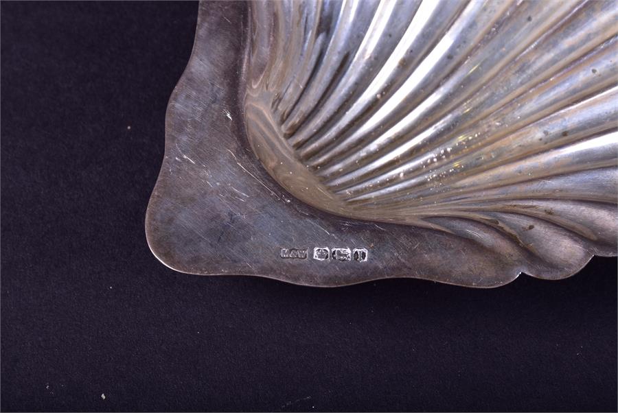 A mixed group of 19th century and later silver dishes and baskets to include two shell formed - Image 8 of 11