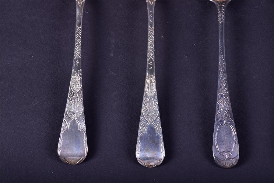 A collection of 18th century and later silver fruit spoons comprising one trio and two pairs, - Image 6 of 9