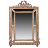 A large 19th century Louis XVI style gilt gesso mirror with elaborate surmountal crest with