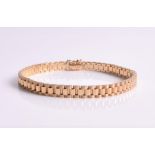 A 14ct yellow gold bracelet composed of textured and polished brick-links, approximate length 20.5