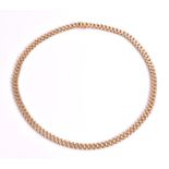 A 14ct yellow gold necklace composed of textured and polished links, 46 cm in length