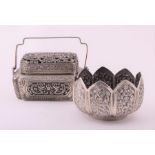 A small Chinese lidded hand warmer and a small Eastern white metal bowl the metalwork warmer with