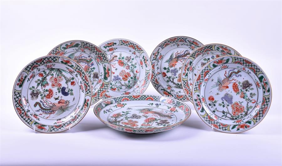 A set of six late 18th/early 19th century Chinese famille verte plates  together with a charger, all