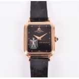 A Baume & Mercier 18ct yellow gold ladies wristwatch of Arabic interest, the rectangular black