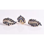 A sapphire and diamond demi-parure comprising: a ring and a pair of pin and clip earrings, each