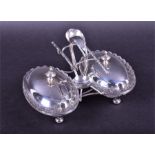 A silver and cut glass double stand condiment set by Mappin & Webb, Sheffield 1895, the silver