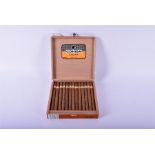 Twenty-five Cuban Cohiba Lanceros cigars in an unsealed hardwood box.