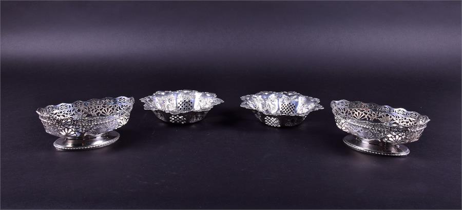 A pair of small Edwardian silver pedestal bowls  maker indistinct, Chester 1908, of pierced border