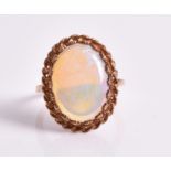 A water opal ring, in 10ct rose gold, size O. CONDITION REPORT Opal fractured