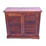 A contemporary mahogany two door wine cabinet opening to reveal a fitted interior holding five lines