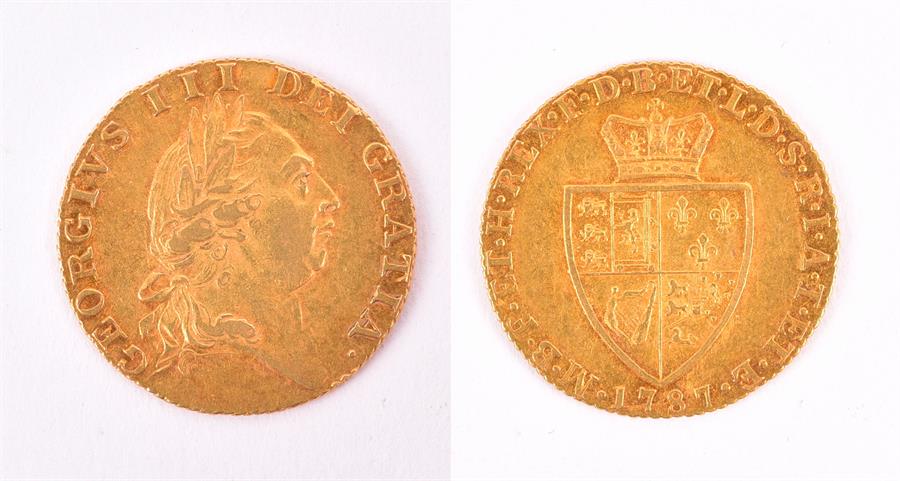 GEORGE III, 1760-1820. GUINEA, 1787 Obv: Laureate bust right. Rev: Crowned 'spade'-shaped shield.