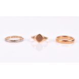 A 22ct yellow gold wedding band 6.8 grams, together with an 18ct yellow gold signet ring, 4 grams,