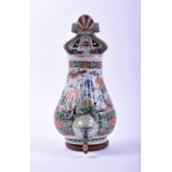 An 18th century Chinese Famille verte porcelain fountain the ribbed body decorated with polychrome